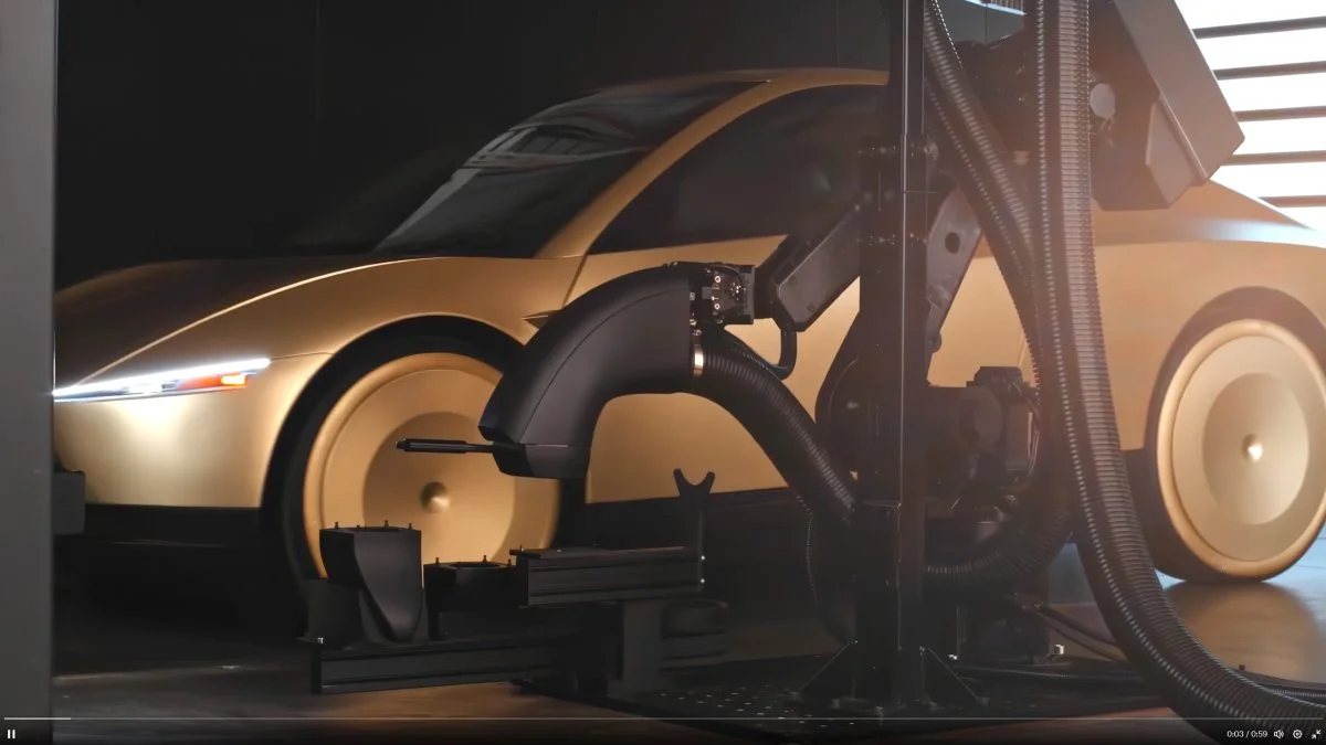 ภาพดีไซน์จำลองสอดคล้องกับหัวเรื่อง ศูนย์บริการแท็กซี่ไร้คนขับของ Tesla เริ่มติดตั้งหุ่นยนต์ทำความสะอาดรถยนต์แล้ว
